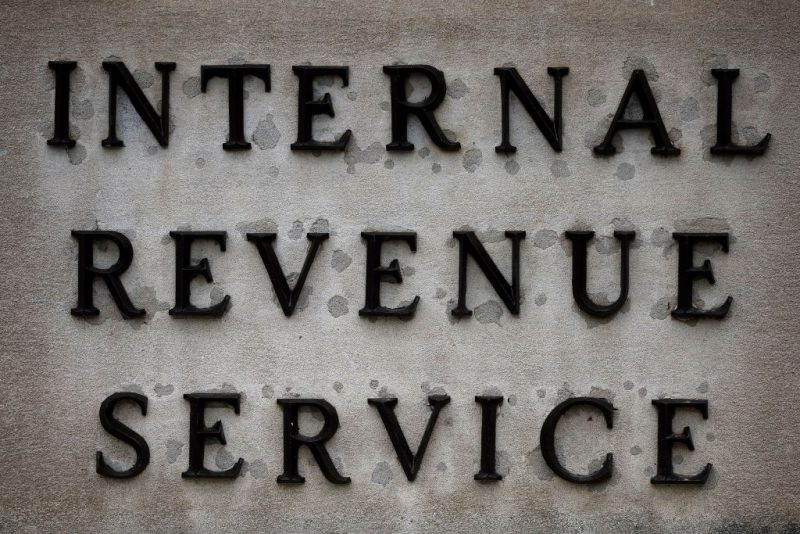 WASHINGTON, DC - APRIL 07: A small sign indicates the headquarters of the Internal Revenue Service on April 07, 2023 in Washington, DC. The Treasury Department announced an $80 billion plan for the IRS to become a “digital first” tax collector and focus on improving customer service and cracking down on tax evasion by corporations and the wealthy. (Photo by Chip Somodevilla/Getty Images)