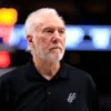 DALLAS, TX - FEBRUARY 14: Head coach Gregg Popovich of the San Antonio Spurs looks on as the Spurs take on the Dallas Mavericks in the first half at American Airlines Center on February 14, 2024 in Dallas, Texas. NOTE TO USER: User expressly acknowledges and agrees that, by downloading and or using this photograph, User is consenting to the terms and conditions of the Getty Images License Agreement. (Photo by Ron Jenkins/Getty Images)