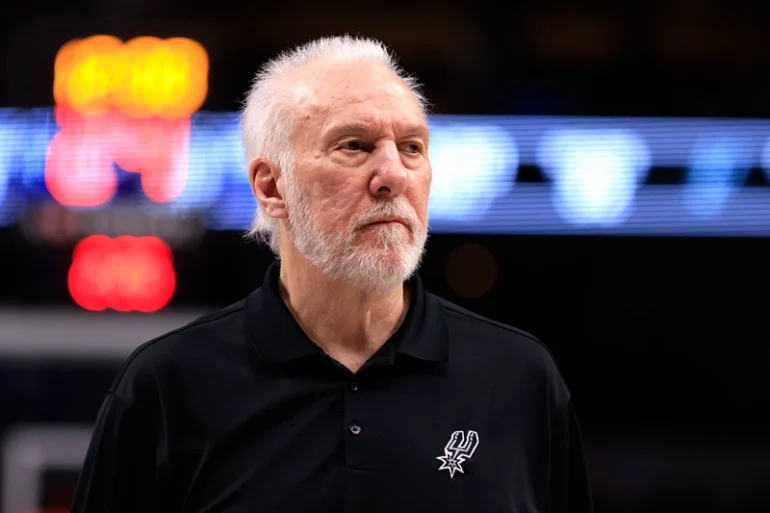 DALLAS, TX - FEBRUARY 14: Head coach Gregg Popovich of the San Antonio Spurs looks on as the Spurs take on the Dallas Mavericks in the first half at American Airlines Center on February 14, 2024 in Dallas, Texas. NOTE TO USER: User expressly acknowledges and agrees that, by downloading and or using this photograph, User is consenting to the terms and conditions of the Getty Images License Agreement. (Photo by Ron Jenkins/Getty Images)