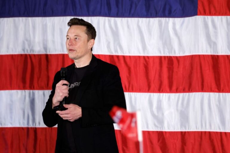 FOLSOM, PENNSYLVANIA - OCTOBER 17: SpaceX and Tesla founder Elon Musk participates in a town hall-style meeting to promote early and absentee voting at Ridley High School on October 17, 2024 in Folsom, Pennsylvania. Musk has donated more than $75 million to America PAC, which he co-founded with fellow Silicon Valley venture capitalists and tech businessmen to support Republican presidential nominee, former President Donald Trump. (Photo by Anna Moneymaker/Getty Images)