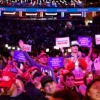 : Supporters of Republican presidential nominee, former U.S. President Donald Trump cheer speakers before he takes the stage at the campaign rally at Madison Square Garden on October 27, 2024 in New York City. Trump closed out his weekend of campaigning in New York City with a guest list of speakers that includes his running mate Republican vice presidential nominee, U.S. Sen. J.D. Vance (R-OH), Tesla CEO Elon Musk, UFC CEO Dana White, and House Speaker Mike Johnson (R-LA), among others, nine days before Election Day. (Photo by Anna Moneymaker/Getty Images)