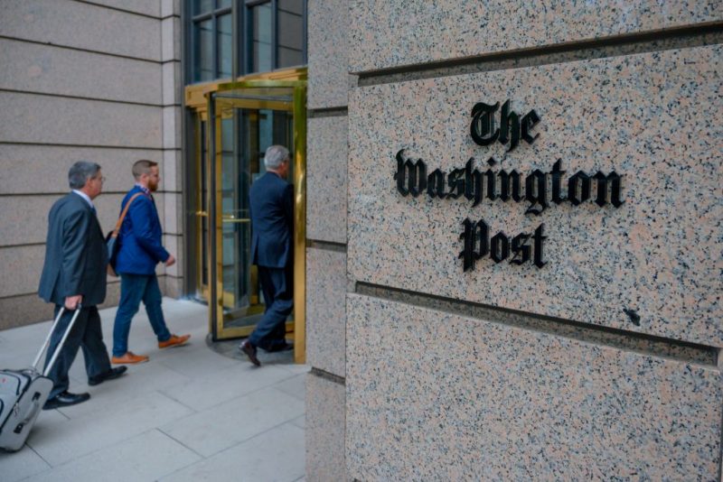 TOPSHOT - The building of the Washington Post newspaper headquarter is seen on K Street in Washington DC on May 16, 2019. - The Washington Post is a major American daily newspaper published in Washington, D.C., with a particular emphasis on national politics and the federal government. It has the largest circulation in the Washington metropolitan area. (Photo by Eric BARADAT / AFP) (Photo by ERIC BARADAT/AFP via Getty Images)