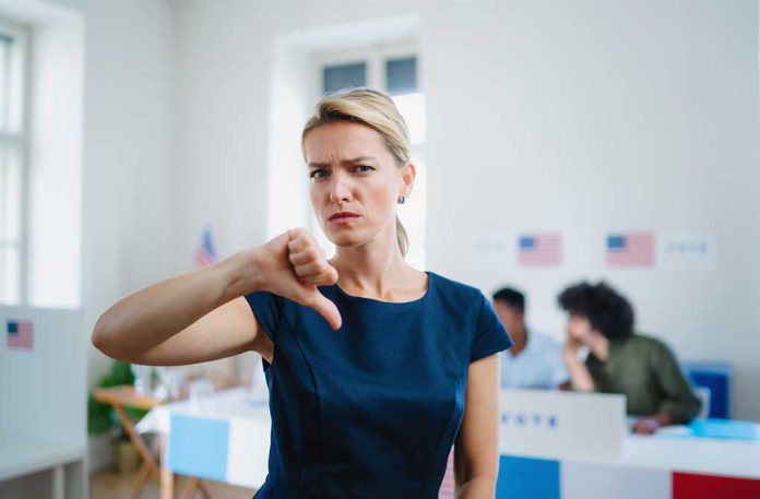 Woman with thumbs down