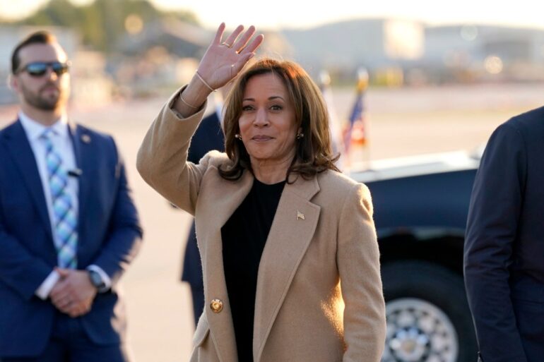 Vice President Kamala Harris waving to the crowd upon her arrival at Raleigh-Durham International Airport on Oct. 12.