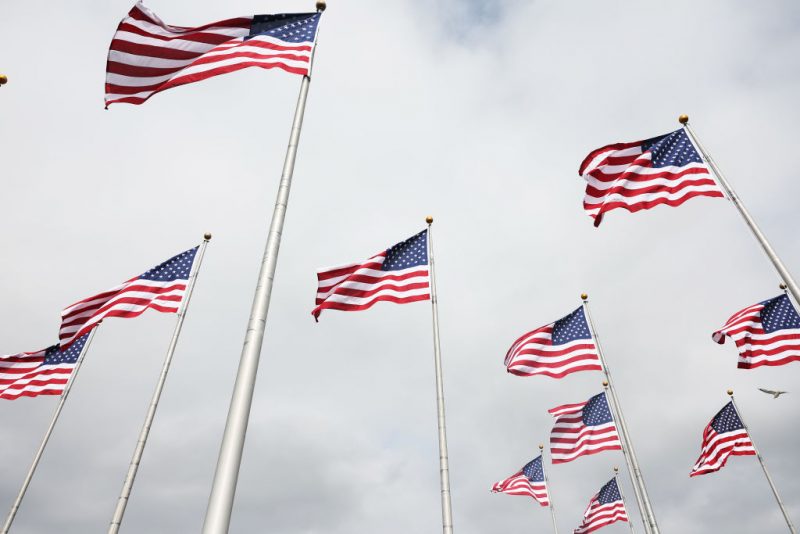 JERSEY CITY, NEW JERSEY - SEPTEMBER 17: American flags are seen waving during a Naturalization Ceremony at Liberty State Park on September 17, 2024 in Jersey City, New Jersey. The U.S. Citizenship and Immigration Services celebrated Constitution Day and Citizenship Day by hosting a Naturalization Ceremony for 50 new U.S. citizens. The ceremony included remarks from New Jersey Lt. Gov. Tahesha L. Way, NJ State Park Service Regional Superintendent Joshua L. Osowski, and President of the Friends of Liberty State Park, Sam Pesin. The new citizens come from 26 countries including Bulgaria, Chad, Cuba, Dominican Republic, Haiti, South Korea and Taiwan. (Photo by Michael M. Santiago/Getty Images)