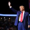 Republican presidential nominee and former U.S. President Donald Trump gestures during a rally in State College, Pennsylvania, U.S. October 26, 2024. REUTERS/Carlos Barria
