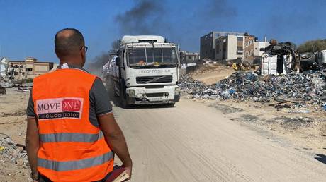 Humanitarian aid trucks belonging to the World Food Programme (WFP) arrive in Gaza via the Erez border crossing on September 26, 2024.