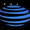 The AT&T logo is seen in a store window, as airports around the country are awaiting for Verizon and AT&T to rollout their 5G technology, in the Manhattan borough of New York City, New York, U.S., January 19, 2022. REUTERS/Brendan McDermid/File Photo