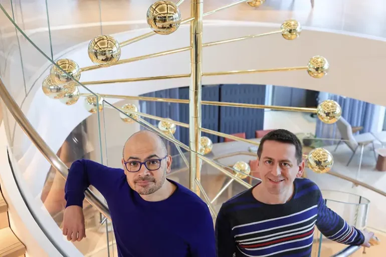 Demis Hassabis and John M. Jumper, two of the three laureates who have been awarded the Nobel Prize in Chemistry for 2024, look on, at the offices of Google DeepMind UK in London, Britain, October 9, 2024. REUTERS/Toby Melville/File Photo