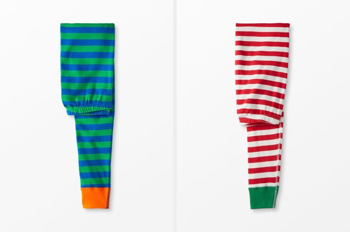 Two pairs of the iconic Hanna Andersson striped pajamas.