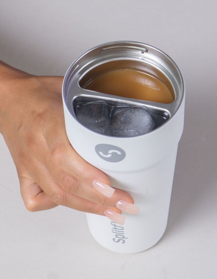 The Splitflask tumbler holds two drinks at once thanks to its dual chambers.