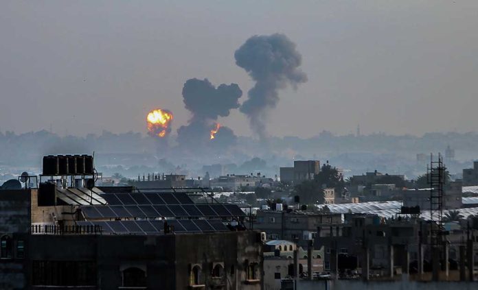 Flames and smoke billowing over a cityscape.