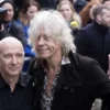 Musician's Midge Ure (L) and Bob Geldof pose as they attend the recording of the Band Aid 30 charity single in west London November 15, 2014. REUTERS/Neil Hall/File Photo