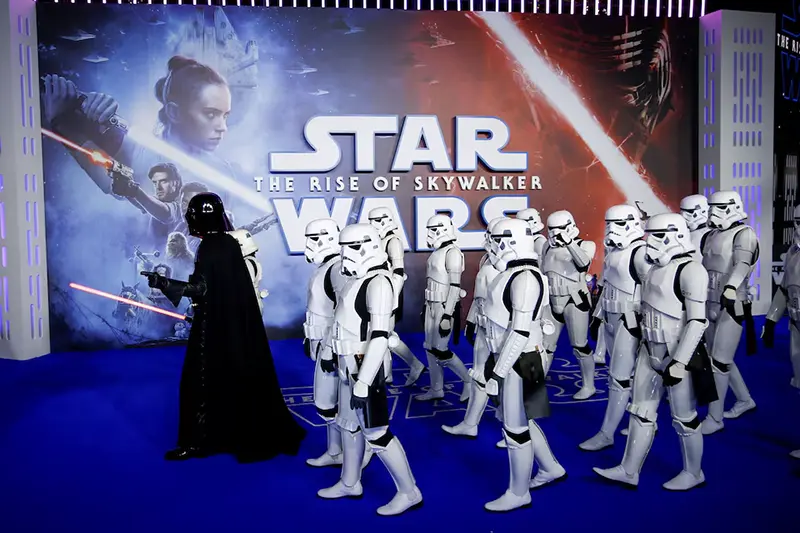 A person dressed as Darth Vader and others as Storm Troopers attend the premiere of "Star Wars: The Rise of Skywalker" in London, Britain, December 18, 2019. REUTERS/Henry Nicholls/File Photo