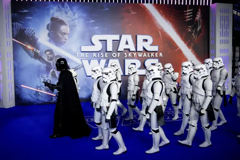 A person dressed as Darth Vader and others as Storm Troopers attend the premiere of "Star Wars: The Rise of Skywalker" in London, Britain, December 18, 2019. REUTERS/Henry Nicholls/File Photo