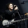 Robert Smith of the British band The Cure performs the Pyramid Stage closing set during Glastonbury Festival in Somerset, Britain June 30, 2019. REUTERS/Henry Nicholls/File Photo