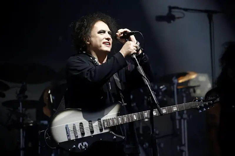 Robert Smith of the British band The Cure performs the Pyramid Stage closing set during Glastonbury Festival in Somerset, Britain June 30, 2019. REUTERS/Henry Nicholls/File Photo