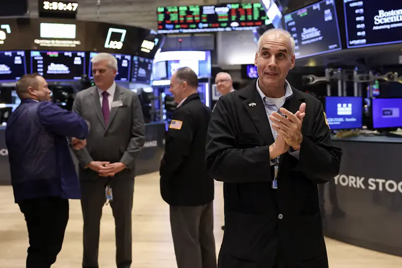 Traders react at the New York Stock Exchange at the end of the trading day, after Republican presidential nominee Donald Trump became U.S. president-elect, in New York City, U.S., November 6, 2024. REUTERS/Andrew Kelly/File Photo