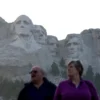 Tourists visit the Mount Rushmore National Memorial, carved with the heads of U.S. presidents George Washington, Thomas Jefferson, Theodore Roosevelt and Abraham Lincoln, in Keystone, South Dakota, U.S. September 6, 2023. REUTERS/Jonathan Ernst/File Photo