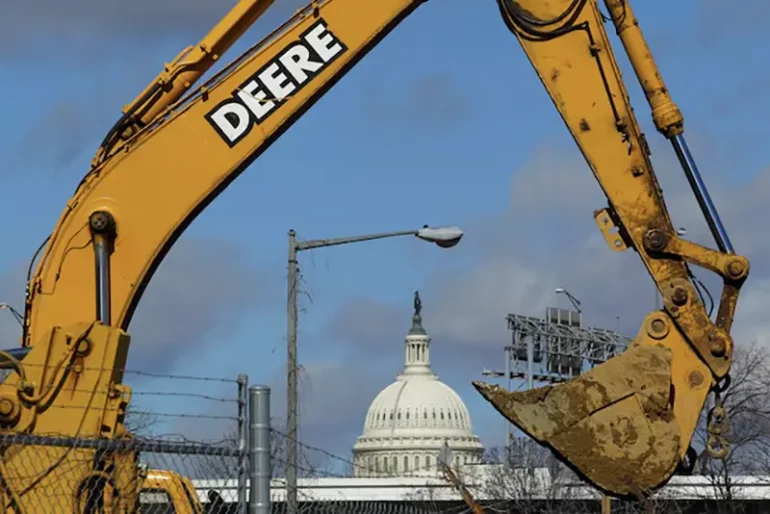 A back loader bucket is seen near the U.S. Capitol in Washington February 27, 2013. REUTERS/Gary Cameron/File Photo