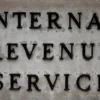 WASHINGTON, DC - APRIL 07: A small sign indicates the headquarters of the Internal Revenue Service on April 07, 2023 in Washington, DC. The Treasury Department announced an $80 billion plan for the IRS to become a “digital first” tax collector and focus on improving customer service and cracking down on tax evasion by corporations and the wealthy. (Photo by Chip Somodevilla/Getty Images)