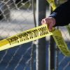 A San Mateo County Sheriff officer puts up police tape at a crime scene after a shooting at the Spanish Town shops in Half Moon Bay, California, on January 24, 2023. - A suspected gunman was in custody Monday over the killing of seven people in a rural community in northern California, just two days after a mass shooting at a Lunar New Year celebration near Los Angeles. (Photo by Samantha Laurey / AFP) (Photo by SAMANTHA LAUREY/AFP via Getty Images)