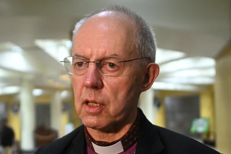 Archbishop of Canterbury Justin Welby speaks during a visit to the tomb of Oscar Arnulfo Romero in San Salvador on June 4, 2024. The leader of the Anglican Church and Archbishop of Canterbury, Justin Welby, said Tuesday that the assassinated Salvadoran Archbishop Oscar Arnulfo Romero, canonized in 2018, is an inspiration to fight against injustice after visiting his tomb in San Salvador. (Photo by Marvin RECINOS / AFP) (Photo by MARVIN RECINOS/AFP via Getty Images)