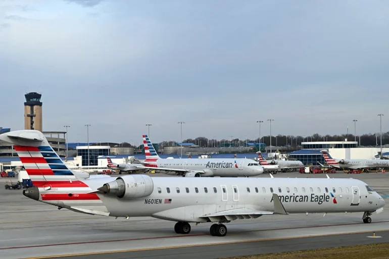 An American Eagle Airlines  Mitsubishi CRJ-900LR aircraft taxis in Charlotte Douglas International Airport (CLT) in Charlotte, North Carolina, on February 10, 2024. (Photo by Daniel SLIM / AFP) (Photo by DANIEL SLIM/AFP via Getty Images)