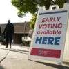 ATLANTA, GEORGIA - OCTOBER 15: Signs direct people where to go to cast their votes on the first day of early voting at Atlanta Metropolitan State College on October 15, 2024 in Atlanta, Georgia. Early voting takes place from October 15 - November 1, ahead of Election Day on November 5. (Photo by Megan Varner/Getty Images)