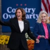 Vice President and Democratic Presidential nominee Kamala Harris walks out with former US representative Liz Cheney during a rally at Ripon College on October 3, 2024 in Ripon, Wisconsin. The rally comes a day after Harris visited Georgia to assess the aftermath of Hurricane Helene. (Photo by Jim Vondruska/Getty Images)