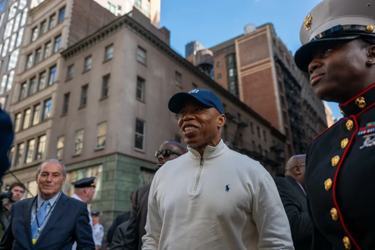 NEW YORK, NEW YORK - NOVEMBER 11: New York City Mayor Eric Adams joins others in the 105th annual Veterans Day Parade on November 11, 2024, in New York City. Hundreds of people lined 5th Avenue to watch the biggest Veterans Day parade in the United States. This year's event included veterans, active soldiers, police officers, firefighters, and dozens of school groups participating in the parade, which honors the men and women who have served and sacrificed for the country. (Photo by Spencer Platt/Getty Images)