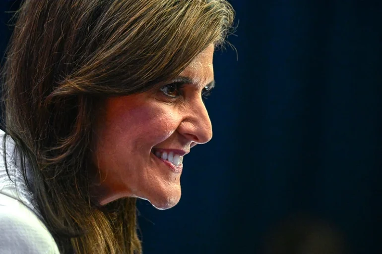 TOPSHOT - Former Governor of South Carolina and United Nations ambassador Nikki Haley speaks to members of the media in the spin room following the third Republican presidential primary debate, at the Adrienne Arsht Center for the Performing Arts in Miami, Florida, on November 8, 2023. (Photo by GIORGIO VIERA / AFP) (Photo by GIORGIO VIERA/AFP via Getty Images)