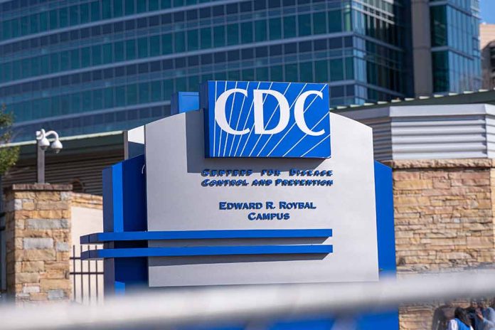 CDC building sign in front of structure.