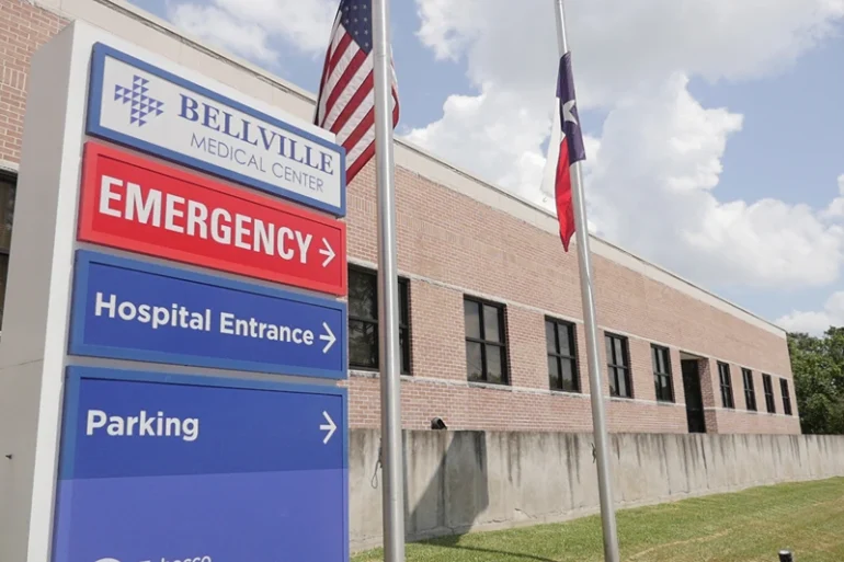 Signs direct to the entrance of the Bellville Medical Center, in Bellville, Texas, September 1, 2021. - Hospitals in Texas are overwhelmed due to record numbers of Covid-19 hospitalizations. In rural areas, the most seriously ill patients are stuck in facilities that are not equipped to handle them. Every day, one of them dies because they cannot find a place in a facility better suited to their needs. (Photo by Francois PICARD / AFP) (Photo by FRANCOIS PICARD/AFP via Getty Images)
