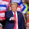 TOPSHOT - Former US President and Republican presidential candidate Donald Trump gestures during a campaign rally at PPG Paints Arena in Pittsburgh, Pennsylvania on November 4, 2024. (Photo by CHARLY TRIBALLEAU / AFP) (Photo by CHARLY TRIBALLEAU/AFP via Getty Images)