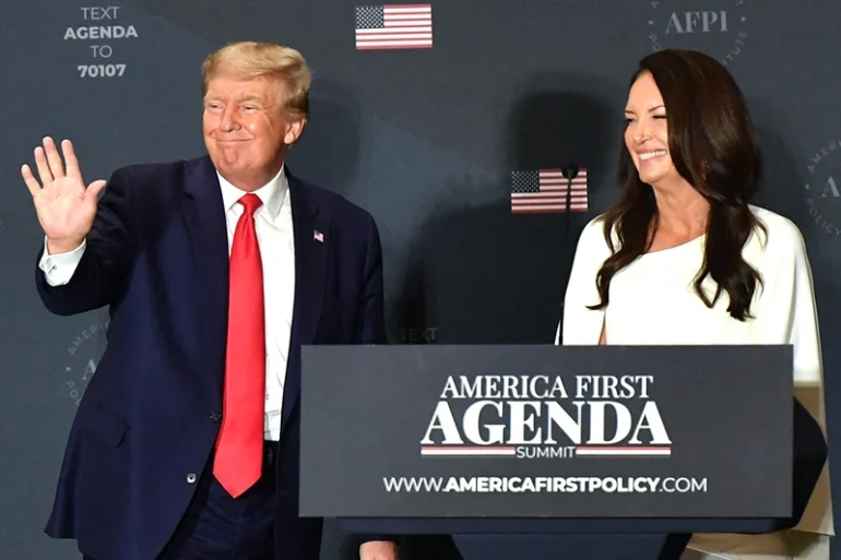 Brooke Rollins, AFPI President & CEO, watches as former US President Donald Trump makes his way off stage after speaking at the America First Policy Institute Agenda Summit in Washington, DC, on July 26, 2022. (Photo by MANDEL NGAN / AFP) (Photo by MANDEL NGAN/AFP via Getty Images)