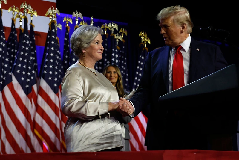 WEST PALM BEACH, FLORIDA - NOVEMBER 05: Republican presidential nominee, former U.S. President Donald Trump praises his campaign senior advisor Susie Wiles during an election night event at the Palm Beach Convention Center on November 06, 2024 in West Palm Beach, Florida. Americans cast their ballots today in the presidential race between Republican nominee former President Donald Trump and Vice President Kamala Harris, as well as multiple state elections that will determine the balance of power in Congress. (Photo by Chip Somodevilla/Getty Images)