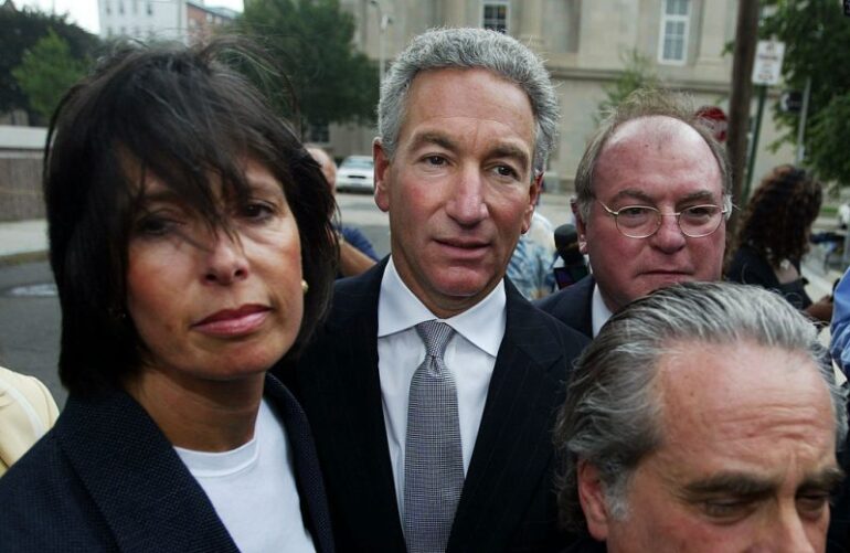 NEWARK, NJ - AUGUST 18: Charles Kushner (C) wades though the media with his legal team and wife to the U.S. District Courthouse August 18, 2004 in Newark, New Jersey. Kushner, a New Jersey developer and a major campaign contributors to Democrats including embattled Gov. Jim McGreevey, is expected to plead guilty to federal charges that he hired a prostitute to try to silence a witness in a federal investigation. (Photo by Chris Hondros/Getty Images)