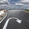 Curved road with a U-turn arrow