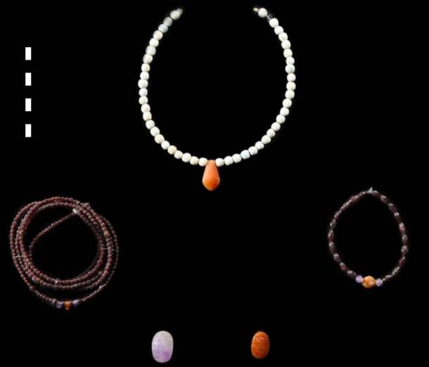 Beaded jewelry and copper alloy mirror with ivory handle found in Middle Kingdom tomb at Luxor. (South Asasif Conservation Project).