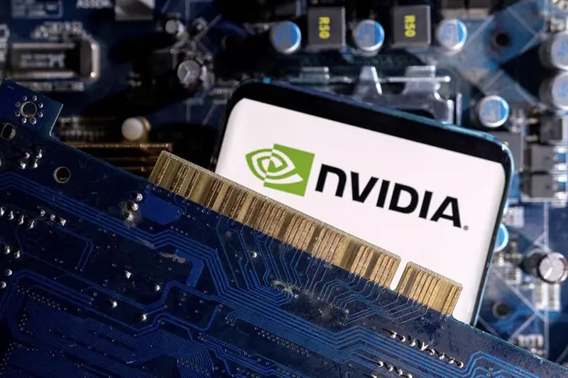 A smartphone with a displayed NVIDIA logo is placed on a computer motherboard in this illustration taken March 6, 2023. REUTERS/Dado Ruvic/Illustration/File Photo