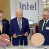 U.S. President Joe Biden looks at a wafer, as he tours the Intel Ocotillo Campus, in Chandler, Arizona, U.S., March 20, 2024. REUTERS/Kevin Lamarque/File Photo