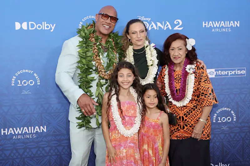 Actor Dwyane Johnson, Jasmine Johnson, Lauren Hashian, Tiana Johnson, and Ata Johnson arrive at the premiere of Disney Animation’s film Moana 2 in Kapolei, Hawaii, U.S. November 21, 2024. REUTERS/Marco Garcia/File Photo