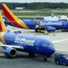 BALTIMORE, MARYLAND - OCTOBER 11: A Southwest Airlines airplane taxies from a gate at Baltimore Washington International Thurgood Marshall Airport on October 11, 2021 in Baltimore, Maryland. Southwest Airlines is working to catch up on a backlog after canceling hundreds of flights over the weekend, blaming air traffic control issues and weather. (Photo by Kevin Dietsch/Getty Images)