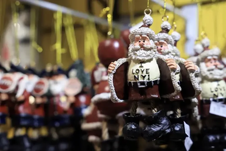 An item depicting Santa Claus hangs in a gift shop, in Bryant Park, in New York City, New York U.S., December 9, 2024. REUTERS/Kent Edwards/File Photo