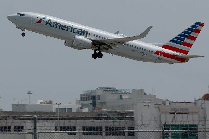 An American Airlines plane takes off from the Miami International Airport on July 20, 2023 in Miami, Florida. The company reported a record quarterly revenue of $14.1 billion, a 4.7% increase from the prior year. (Photo by Joe Raedle/Getty Images)