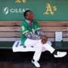 Former Oakland Athletics player Rickey Henderson sits in the dugout before the Oakland Athletics game against the Texas Rangers at the Oakland Coliseum on September 26, 2024 in Oakland, California. Today will be the final Athletics game played at the Coliseum. (Photo by Ezra Shaw/Getty Images)