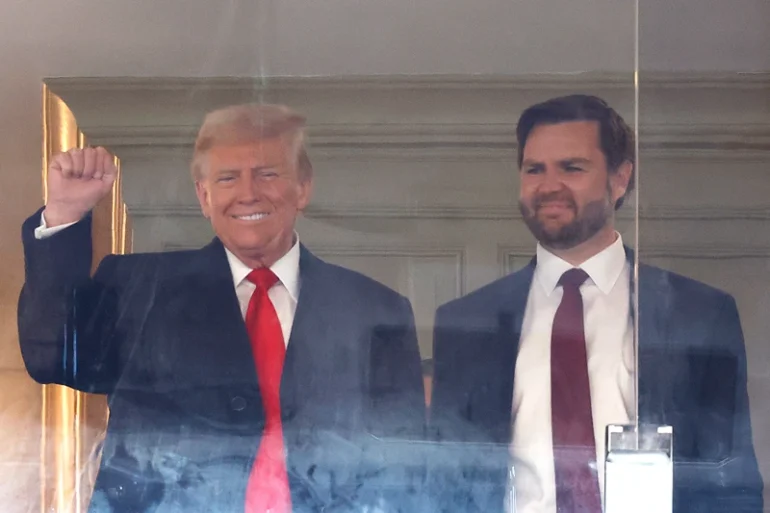 U.S. President-elect Donald Trump and Vice President-elect JD Vance attend the 125th Army-Navy football game at Northwest Stadium on December 14, 2024 in Landover, Maryland. Trump is attending the game with lawmakers and Cabinet nominees including, Vice President-elect JD Vance, Speaker of the House Mike Johnson (R-LA), Defense Secretary nominee Pete Hegseth, Gov. Ron DeSantis (R-FL) and Daniel Penny, a military veteran who was acquitted of criminally negligent homicide in a choke hold death of a New York subway rider. (Photo by Kevin Dietsch/Getty Images)