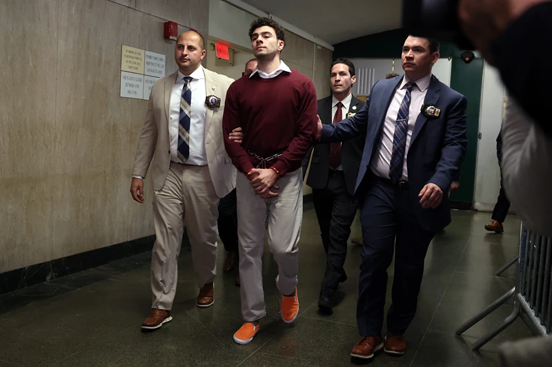 NEW YORK, NEW YORK - DECEMBER 23: Luigi Mangione departs Manhattan Criminal Court on December 23, 2024 in New York City. Mangione, 26, appeared for his arraignment on state murder charges in the killing of UnitedHealthcare CEO Brian Thompson on a Manhattan street on December 4. (Photo by Spencer Platt/Getty Images)