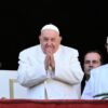 TOPSHOT - Pope Francis greets the crowd from the main balcony of St. Peter's basilica after the Urbi et Orbi message and blessing to the city and the world as part of Christmas celebrations, at St Peter's square in the Vatican on December 25, 2024. (Photo by Alberto PIZZOLI / AFP) (Photo by ALBERTO PIZZOLI/AFP via Getty Images)